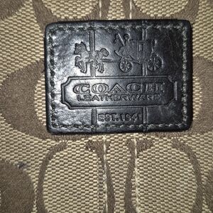 Coach Wrislet  Brown Leather Trim with Tattersall on interior lining EUC.